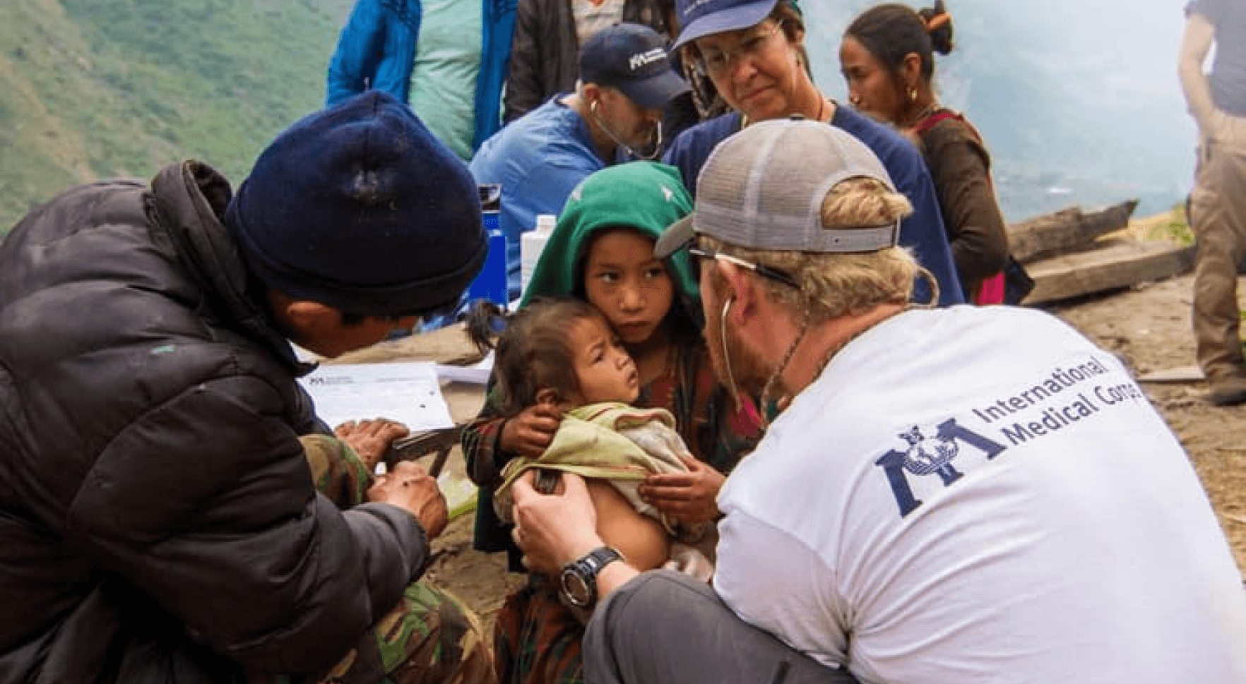 Clinician providing humanitarian care in a resource-limited community