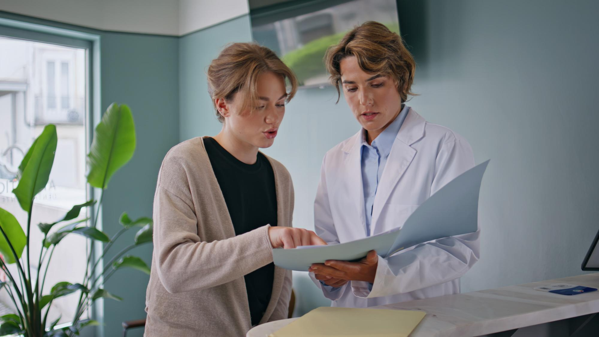 Clinician consulting with a colleague